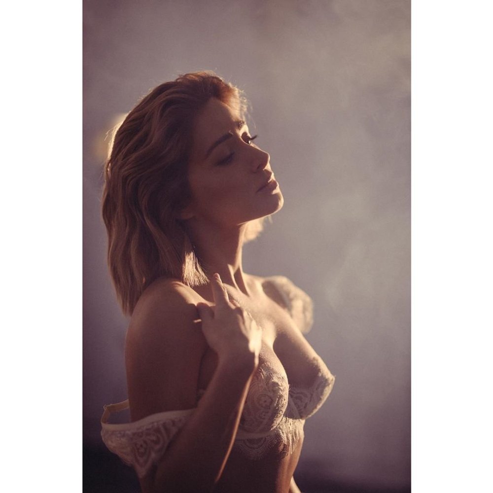 Naked women in indecent poses