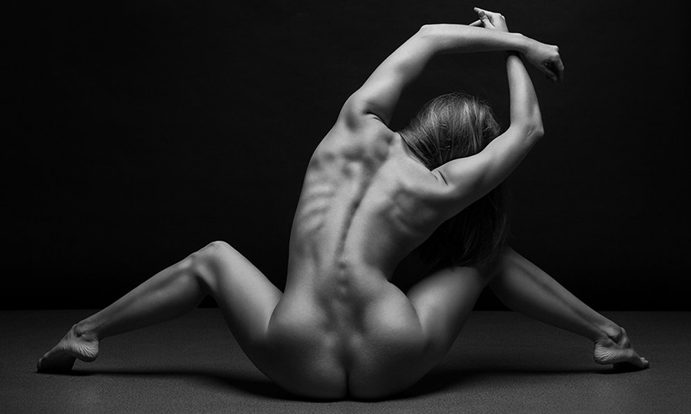Chiseled female figures naked