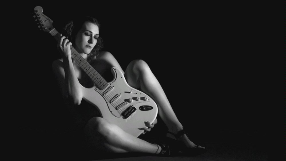 Naked guitarist