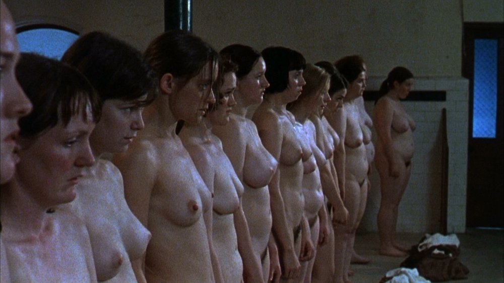 Naked women behind bars