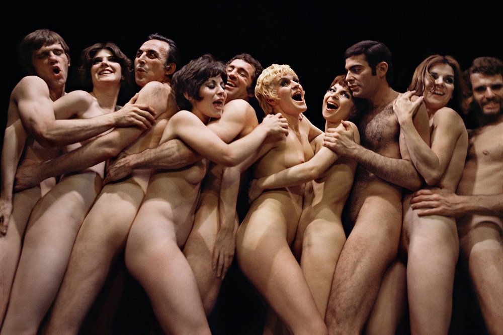 Naked girls among people