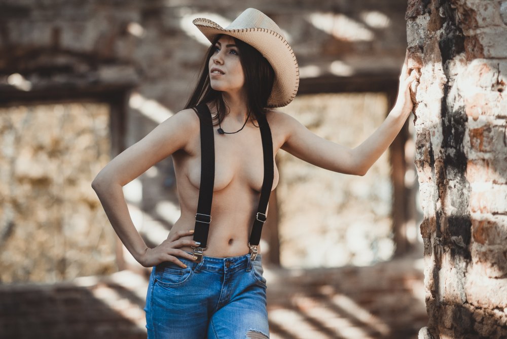 Naked women cowboy