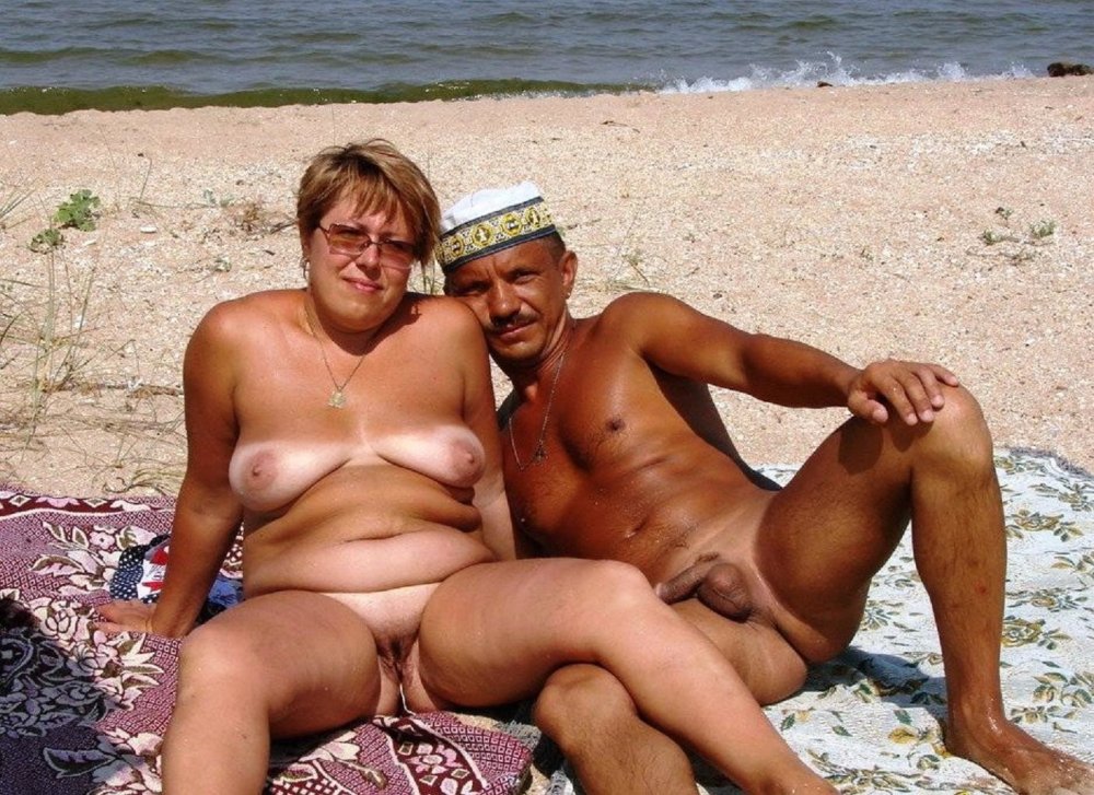 Naked elderly couples on the beach