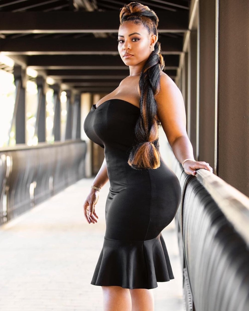 Busty girls in a tight dress