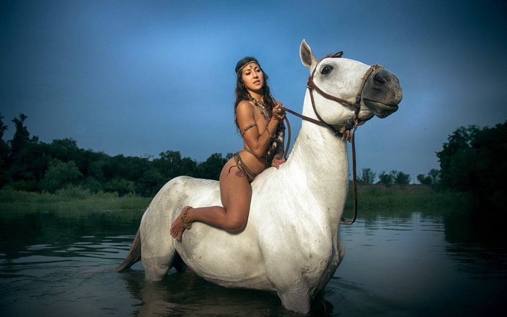 Girls riding a pony