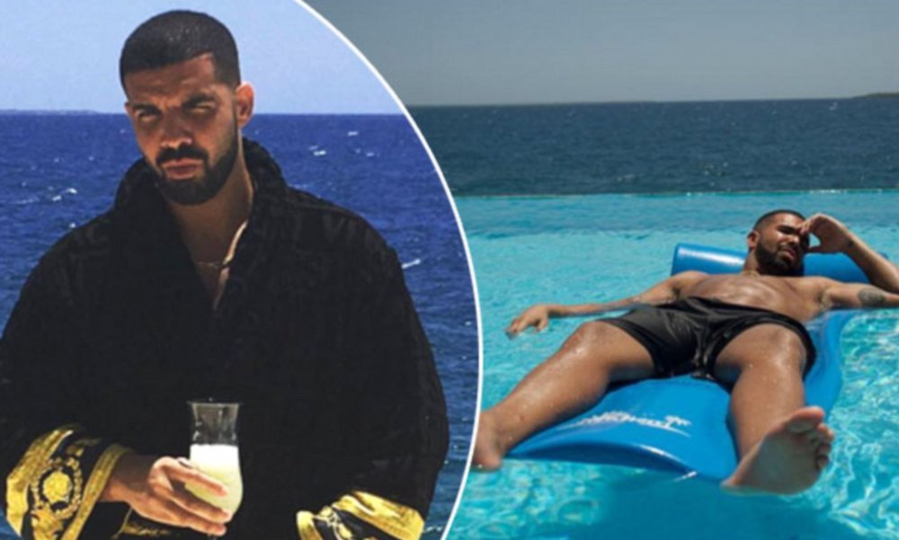 Drake without a T -shirt