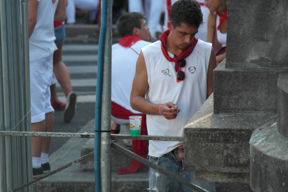MAN PEEING PUBLICLY