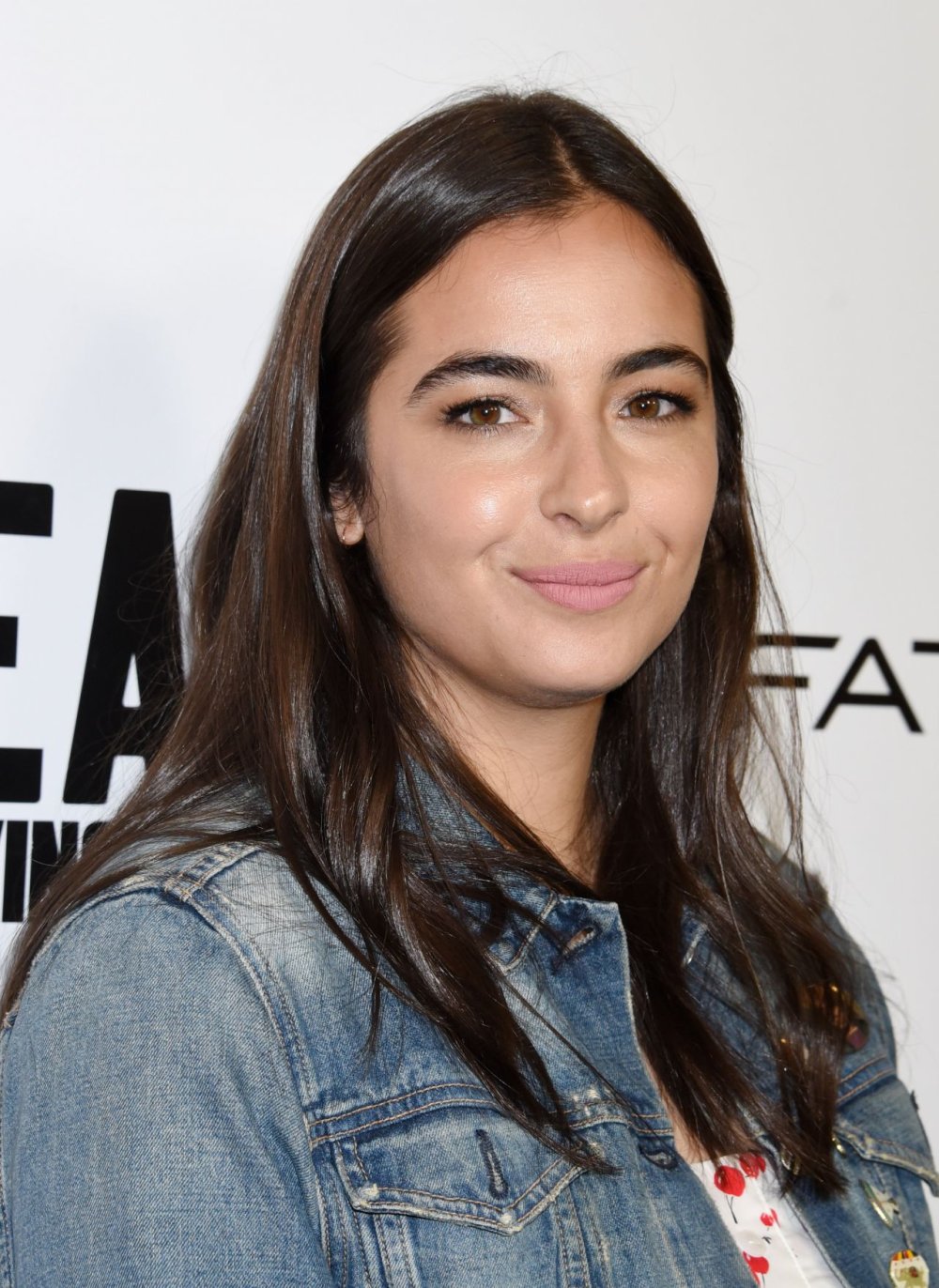 Alanna Masterson in a dress