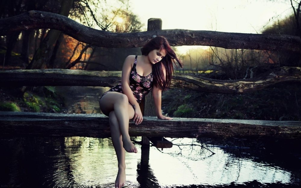 Girl by the river