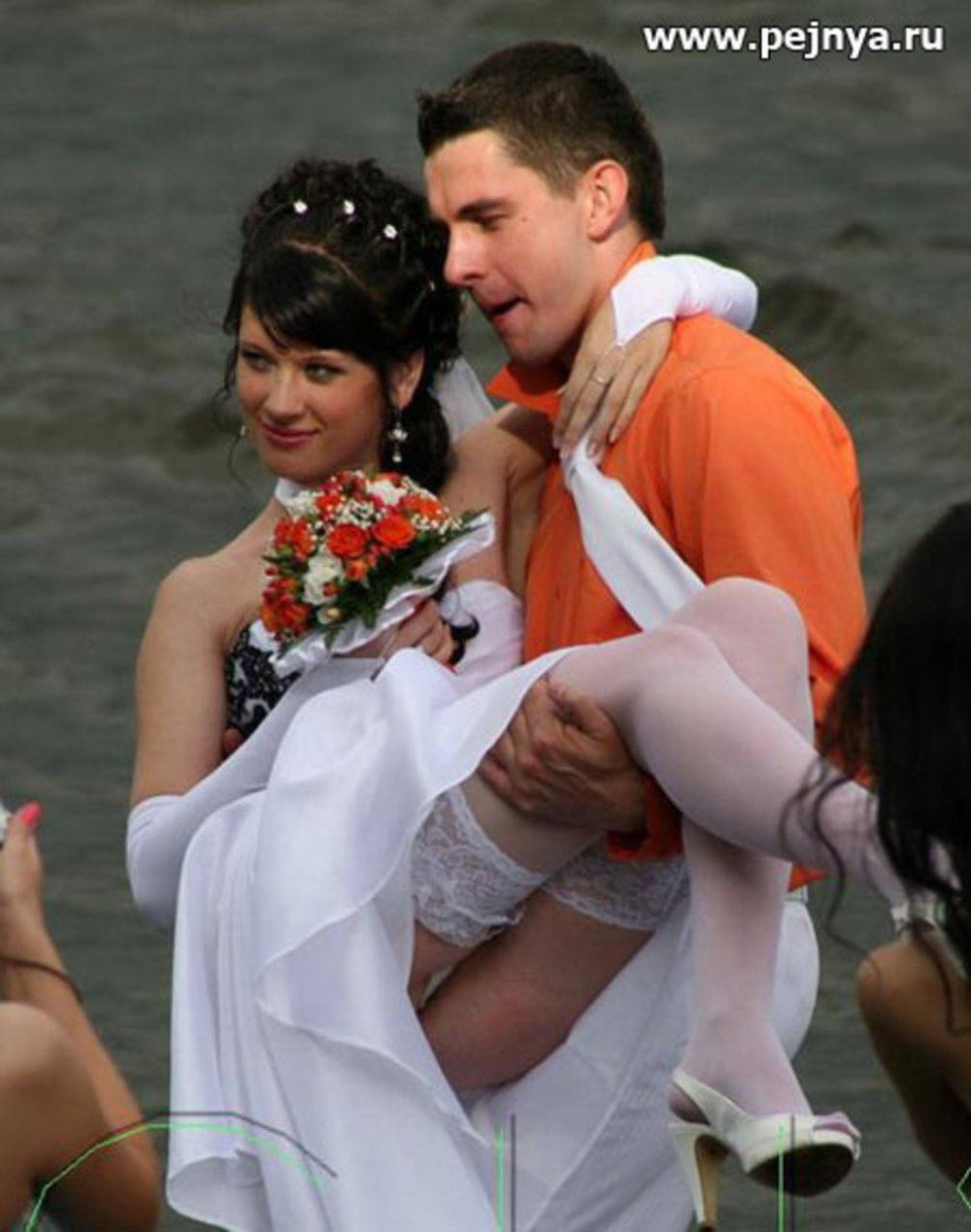 Under the hem of the skirt