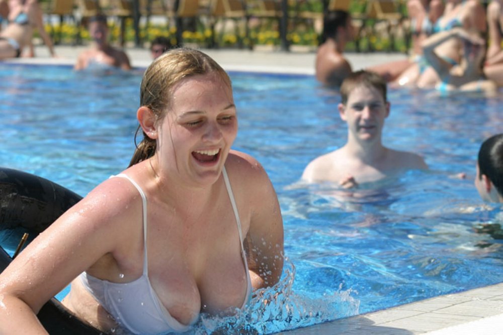 Girl swimming in the sea naked