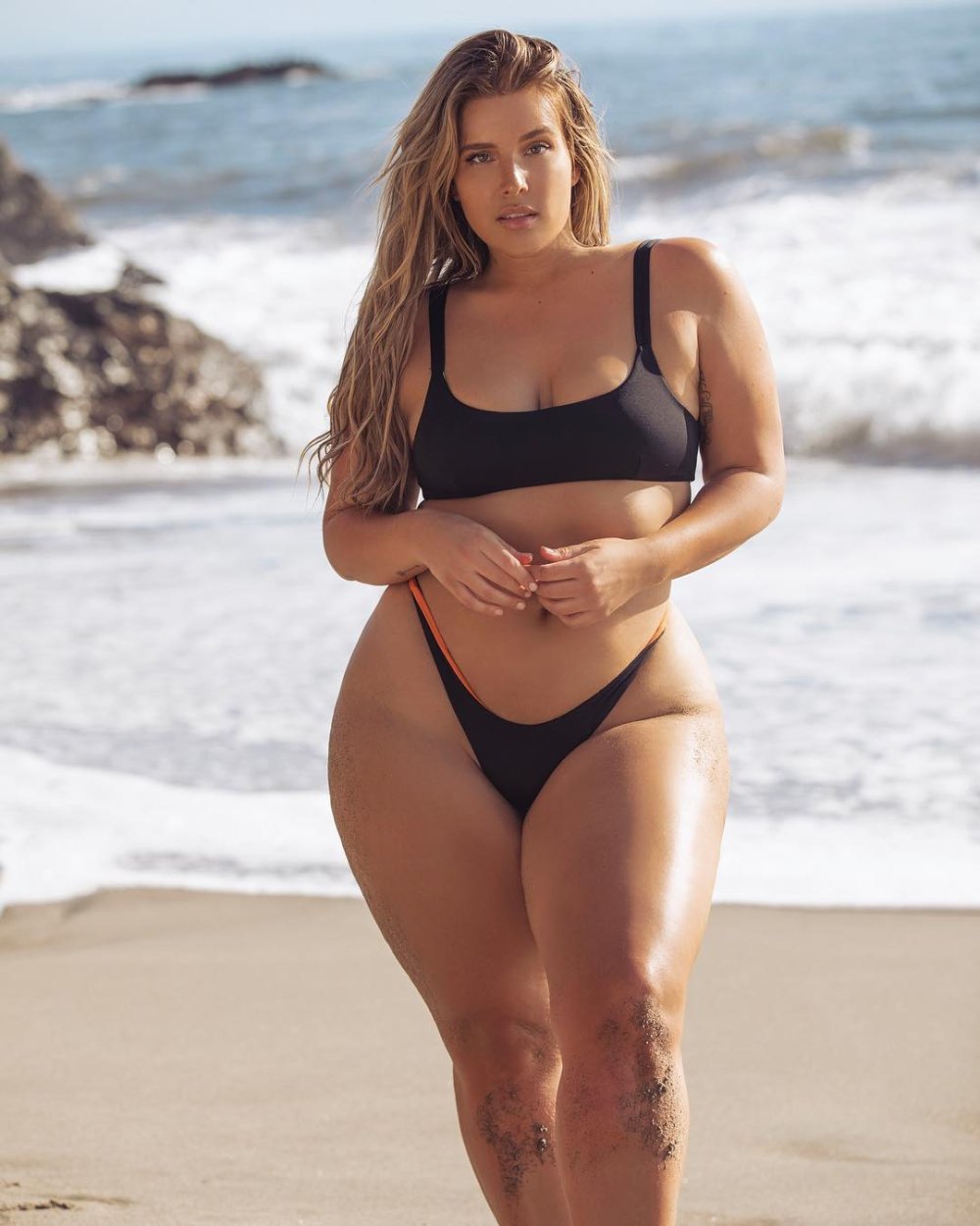 Women with wide hips on the beach