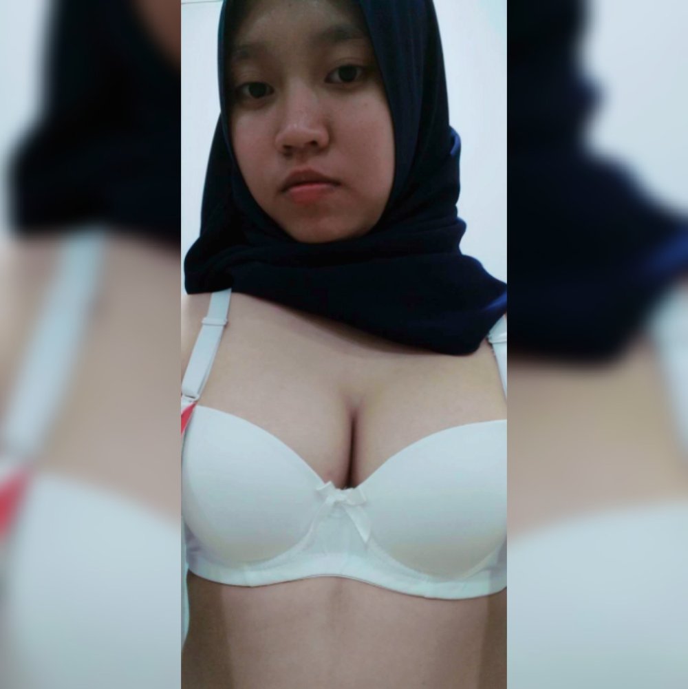 He touches in a hijab