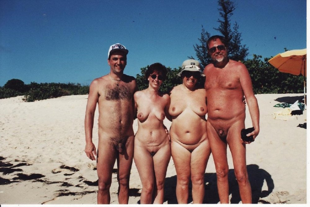 Naked couples on the beach