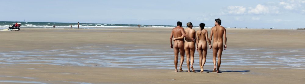 Naked couples on the beach