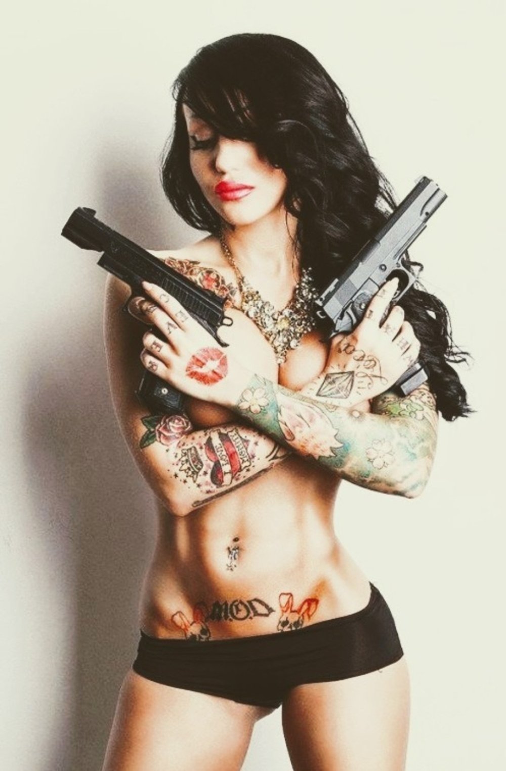 Christie Ain with weapons