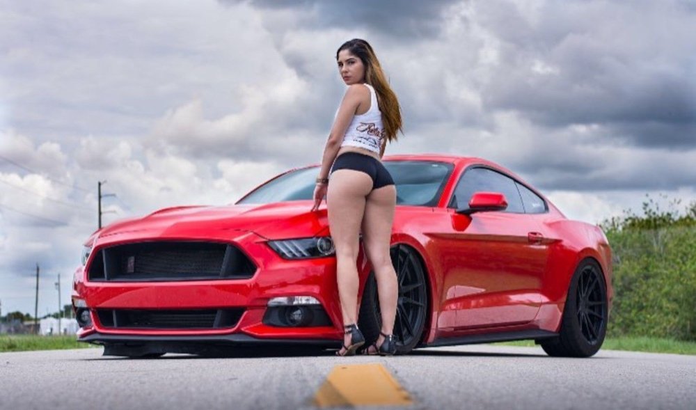 Red Ford Mustang and Girl