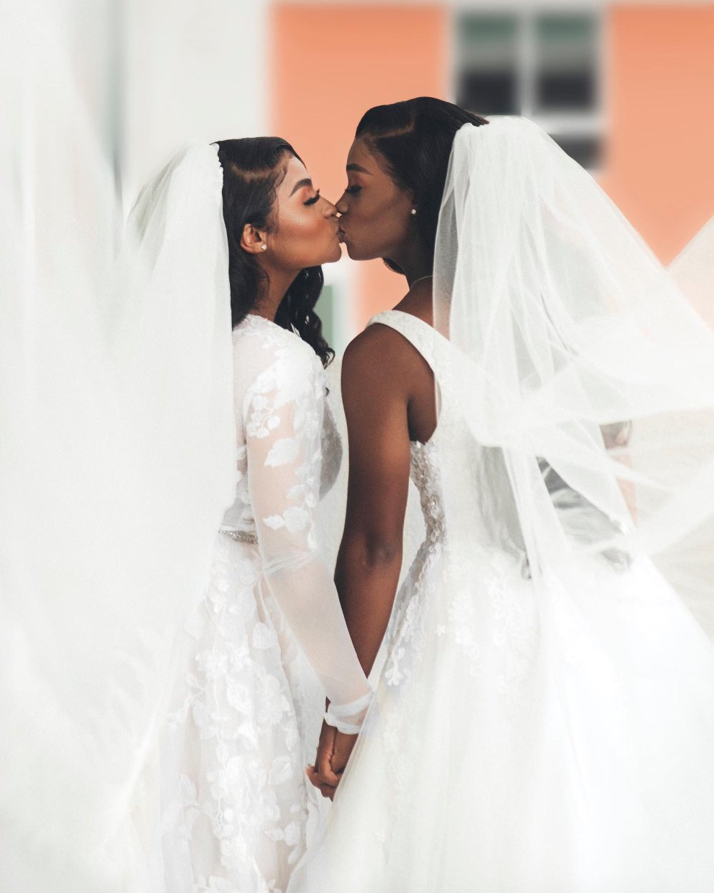 Two girls in wedding dresses