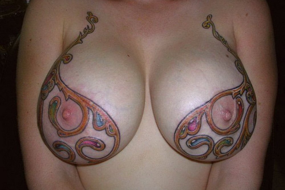 Huge tattooed boobs