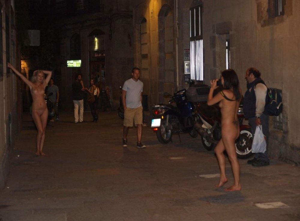 Naked women in crowded places