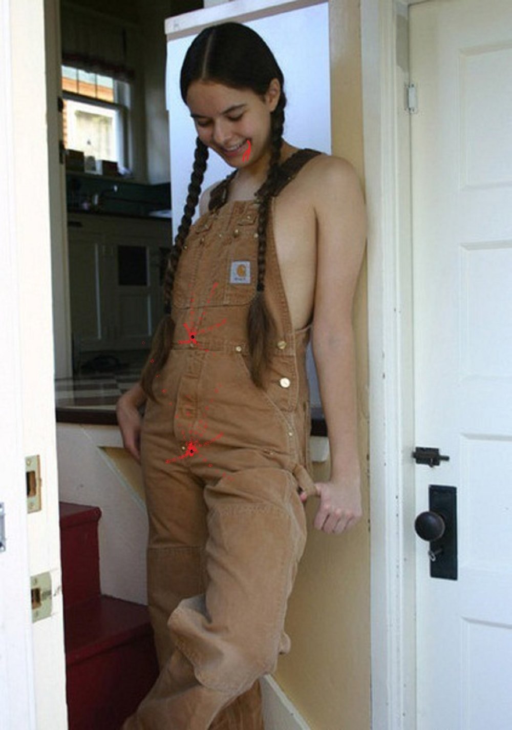 Tits in jeans overalls