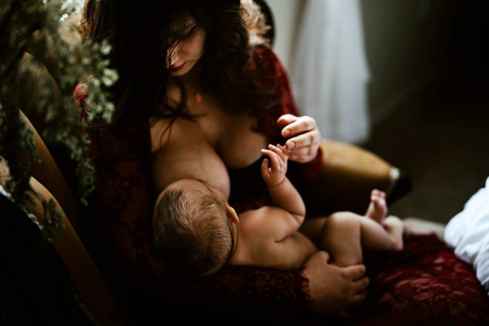 Naked mothers breastfeed