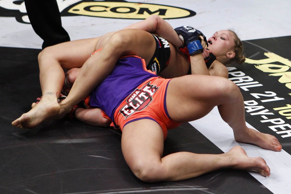 The silhouettes of MMA fighters