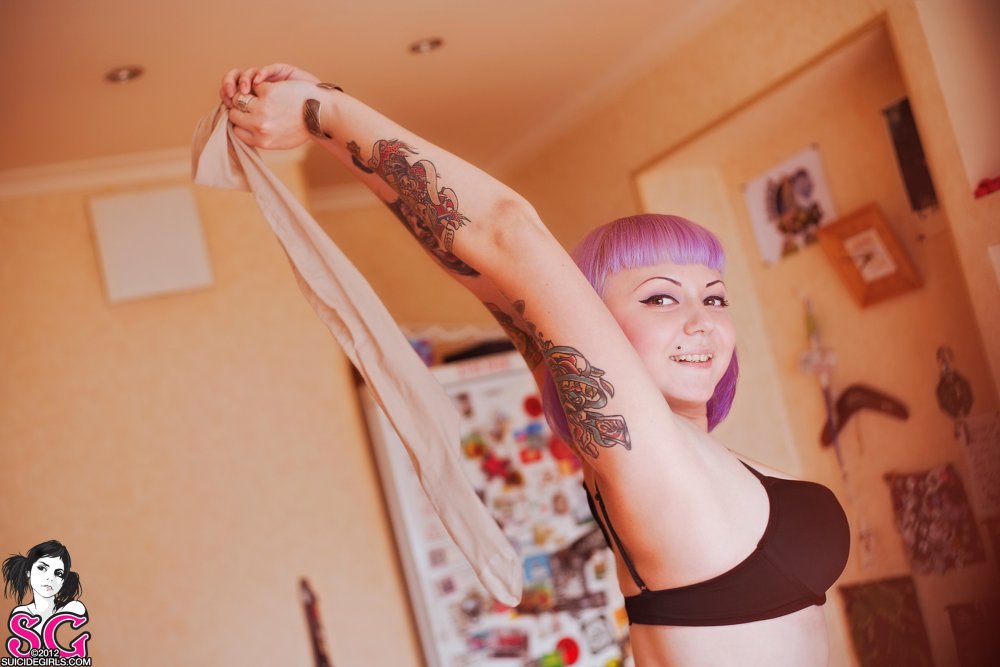 Girl with a member of Suicidegirls