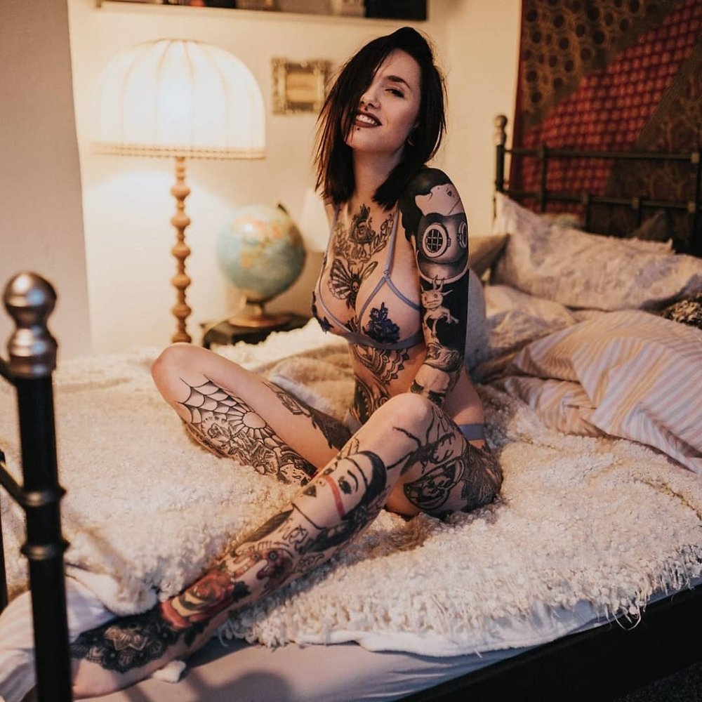 Tattooed girl in linen