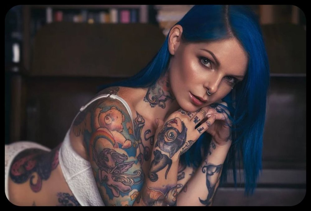 Blurry image of a girl tattoo