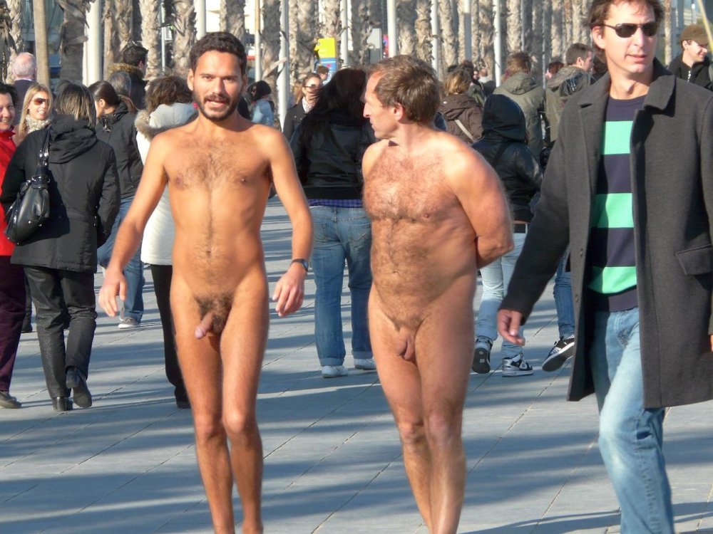 Naked men in a belt of fidelity on the beach