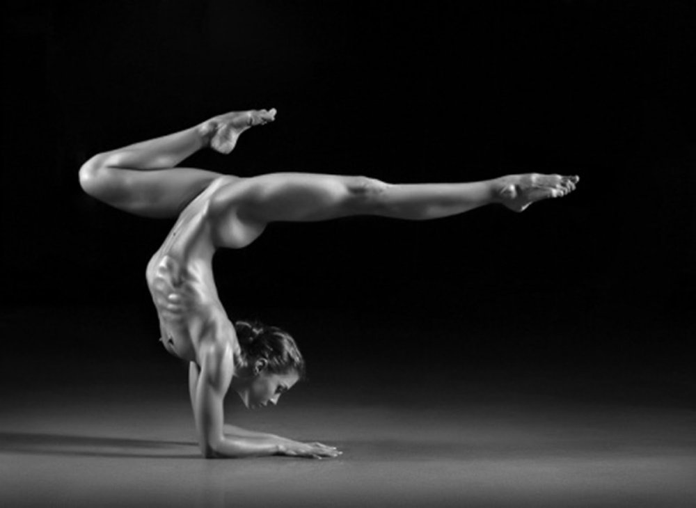 Naked athlete with a ball