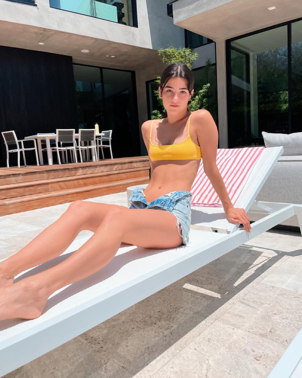 Charlie Damelio in a swimsuit turned a booty