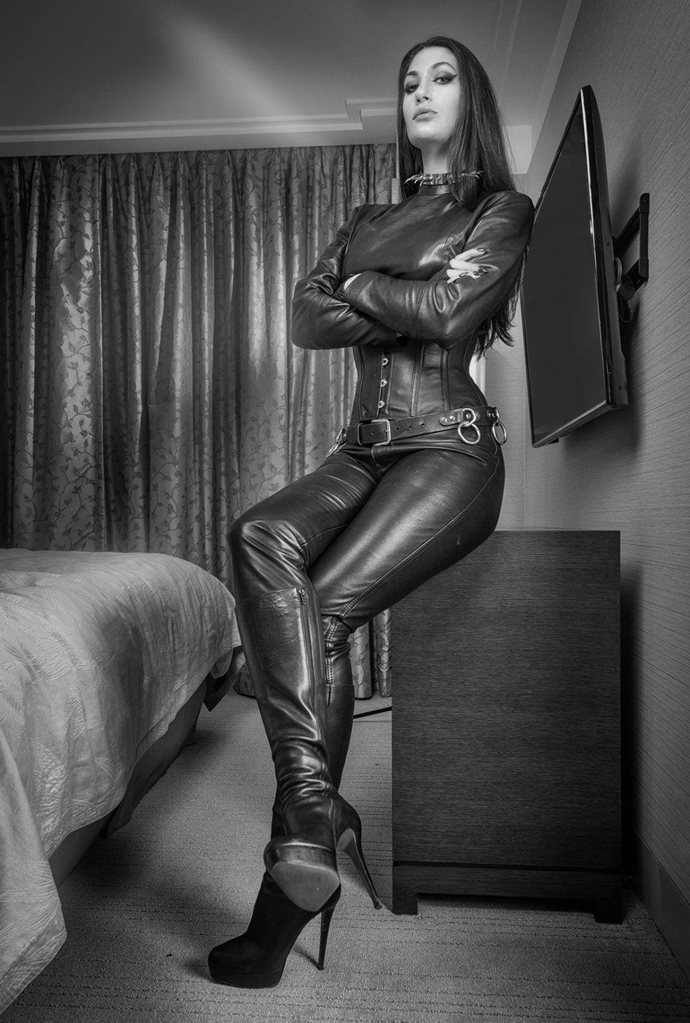 Female dominance in leather clothes