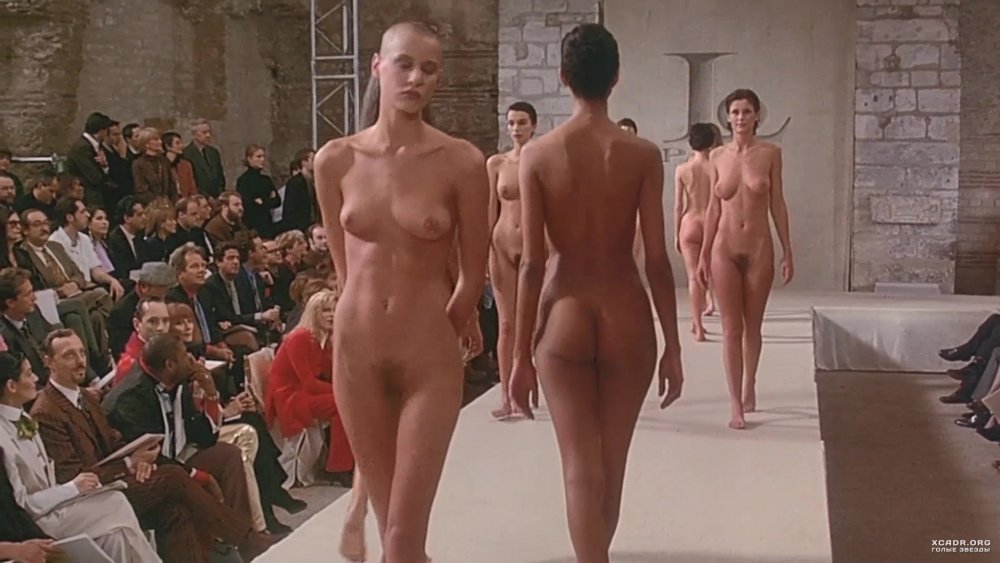 Naked women walk on the podium