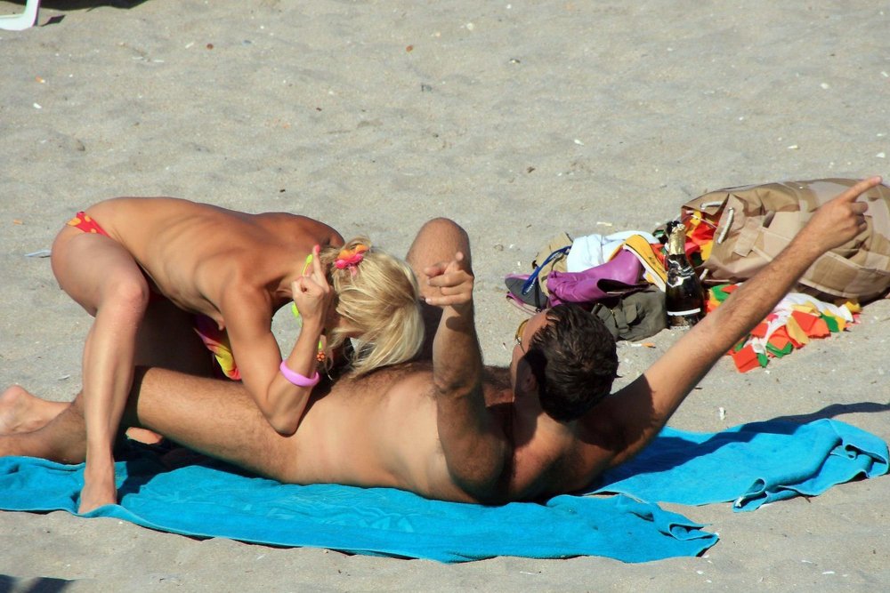 Erotic caps on the beach