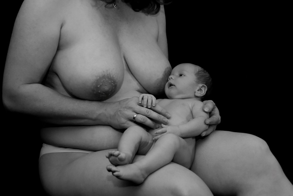 Nude breastfeeding