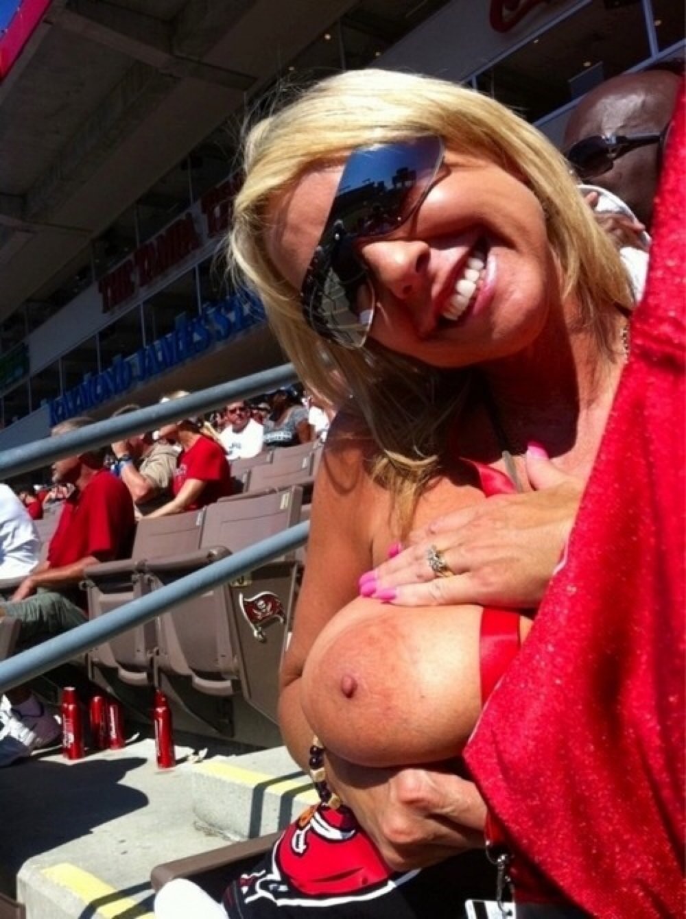 Exposed his breasts in public