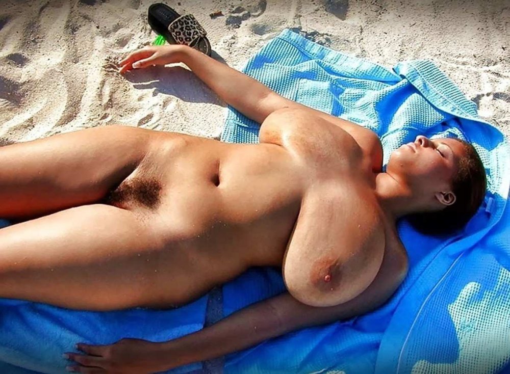 Women with big tits on the beach