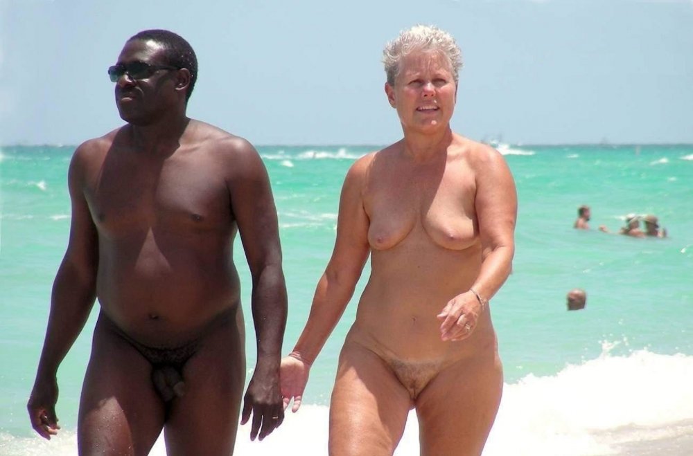 Naked women and men Negros on the beach