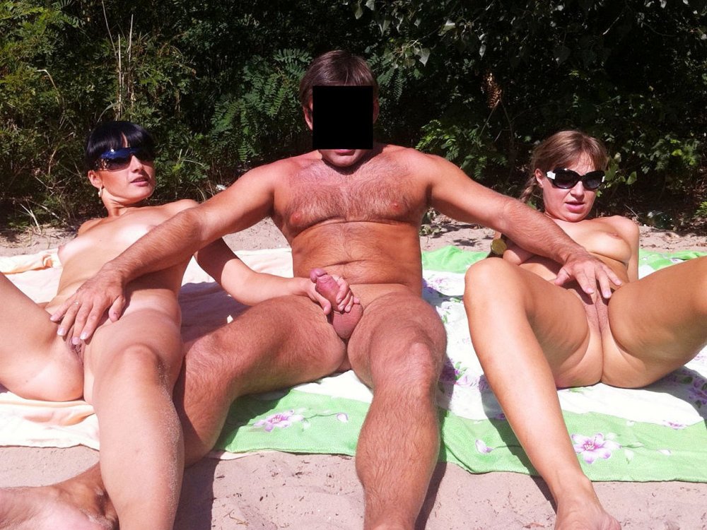 Gangbang with mature on the beach