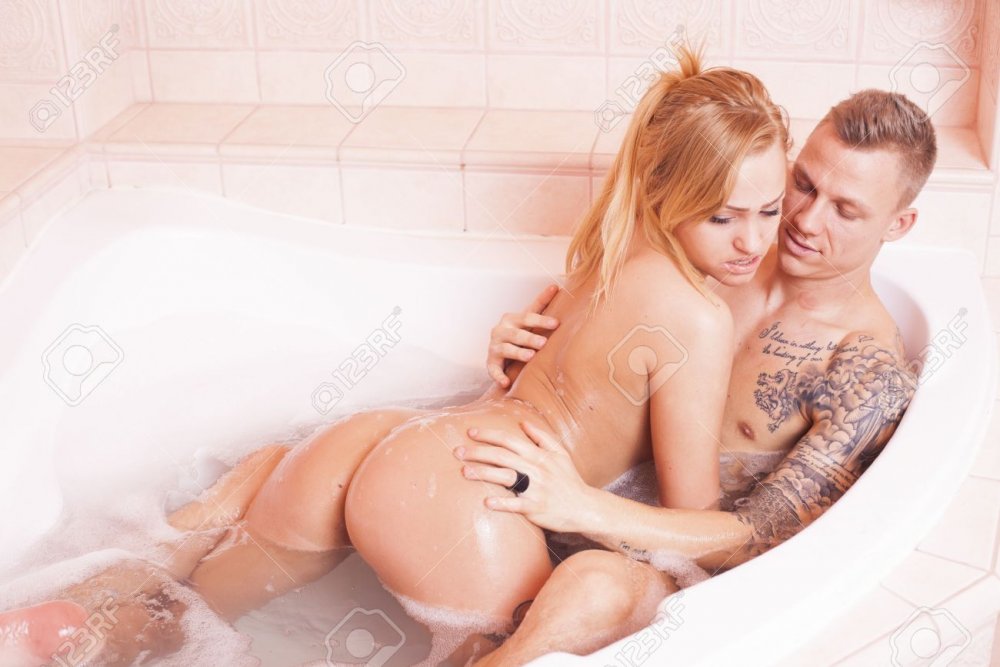 Naked hug in the bath