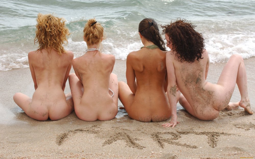 Naked women's priests on the beach