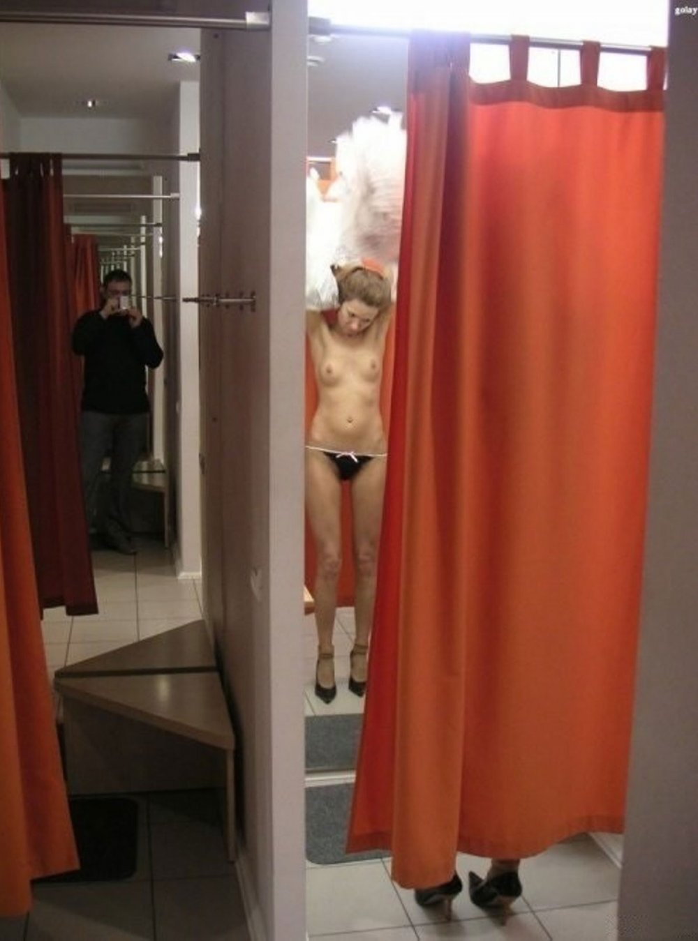 Naked beauty in fitting room