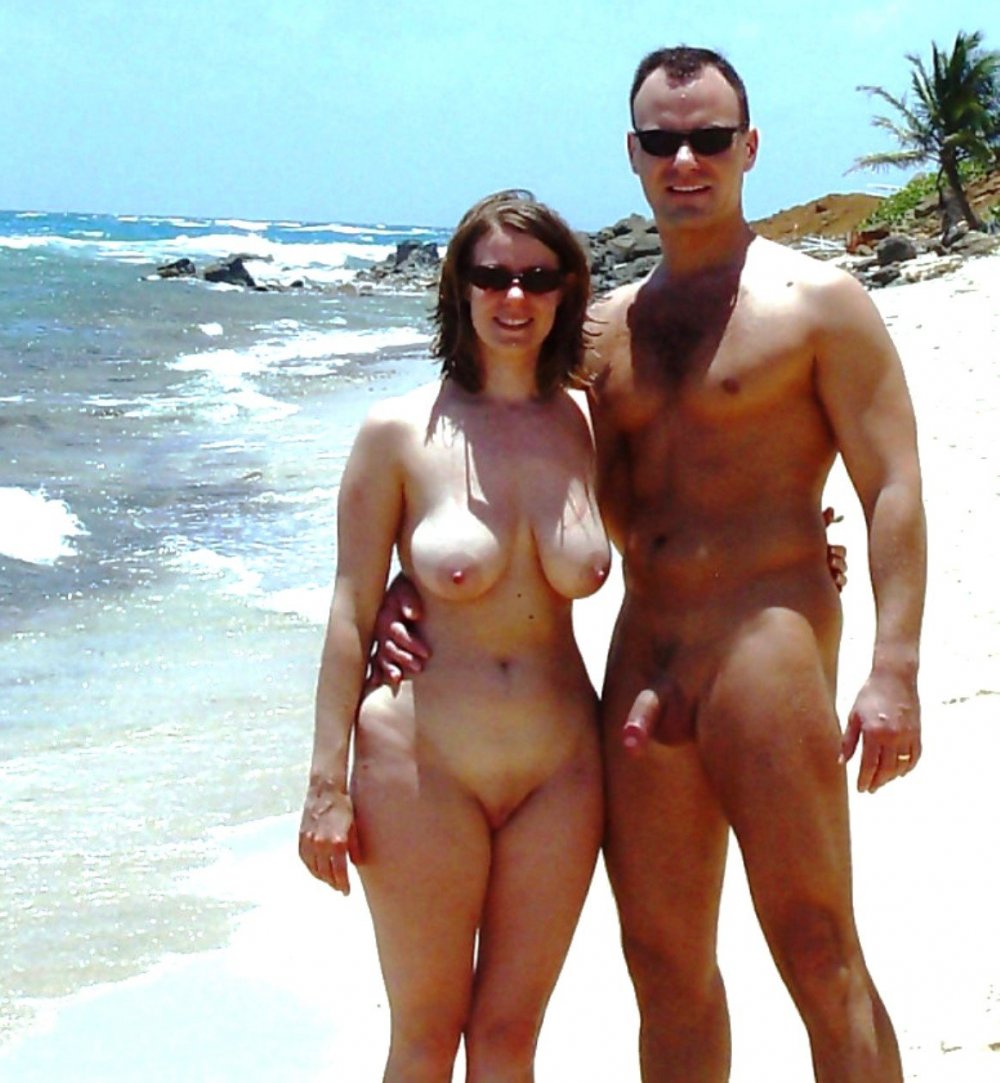 Naked men and women on the beach