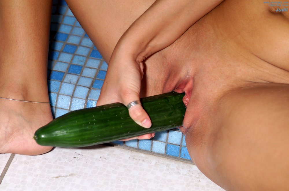 Long cucumber in the pussy