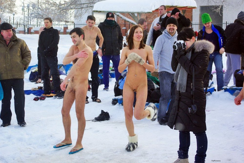 Naked guys bathe in the hole