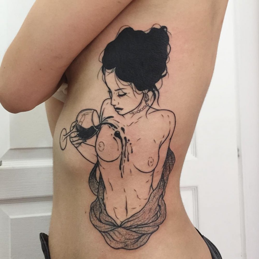 Erotic tattoo on the buttocks