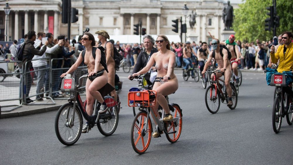 Naked nudist on a bike