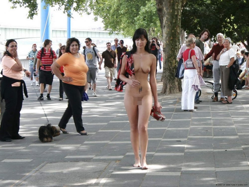 Girl undresses in public